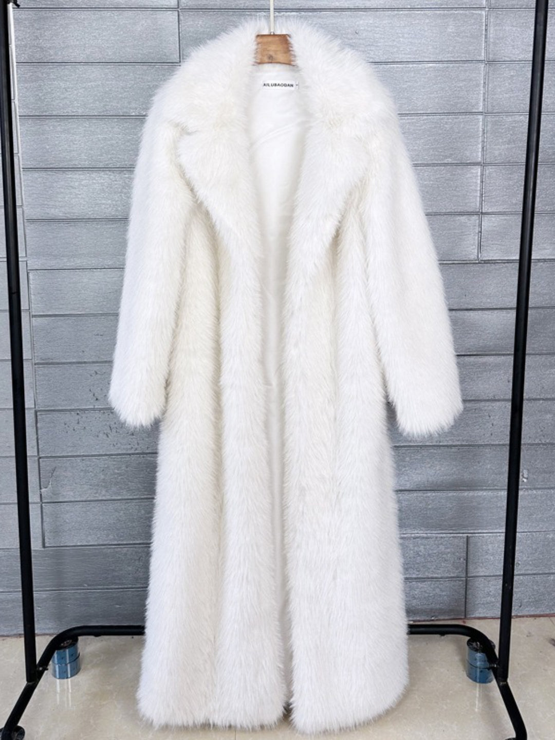 Women's Long Hooded Faux Winter Jacket with Asymmetrical Hem